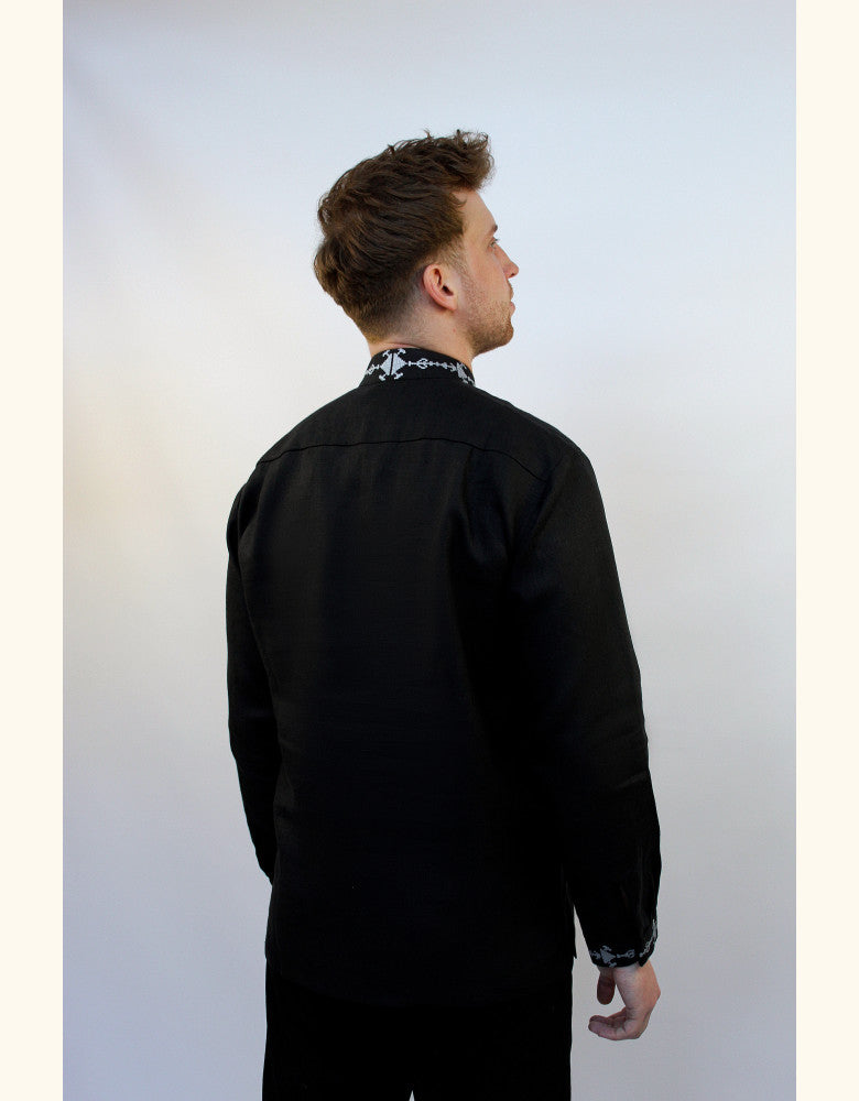 Star pattern embroidery on black men’s vyshyvanka