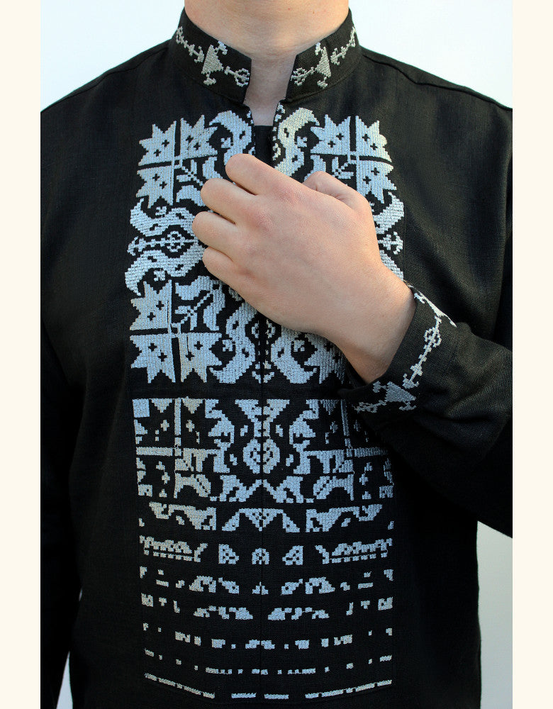Star pattern embroidery on black men’s Ukrainian vyshyvanka