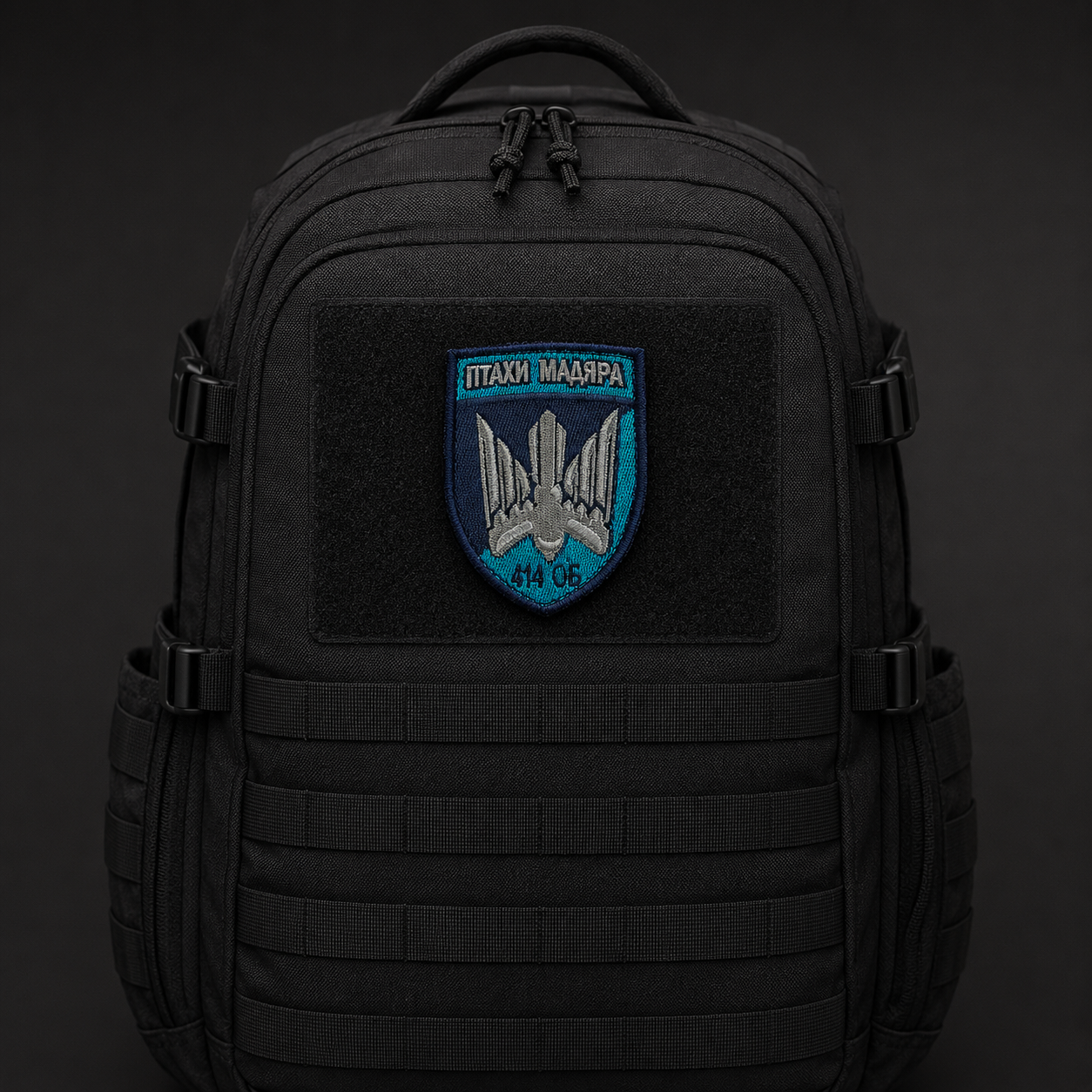 Birds of Magyar 414th Brigade patch centred on a black tactical backpack
