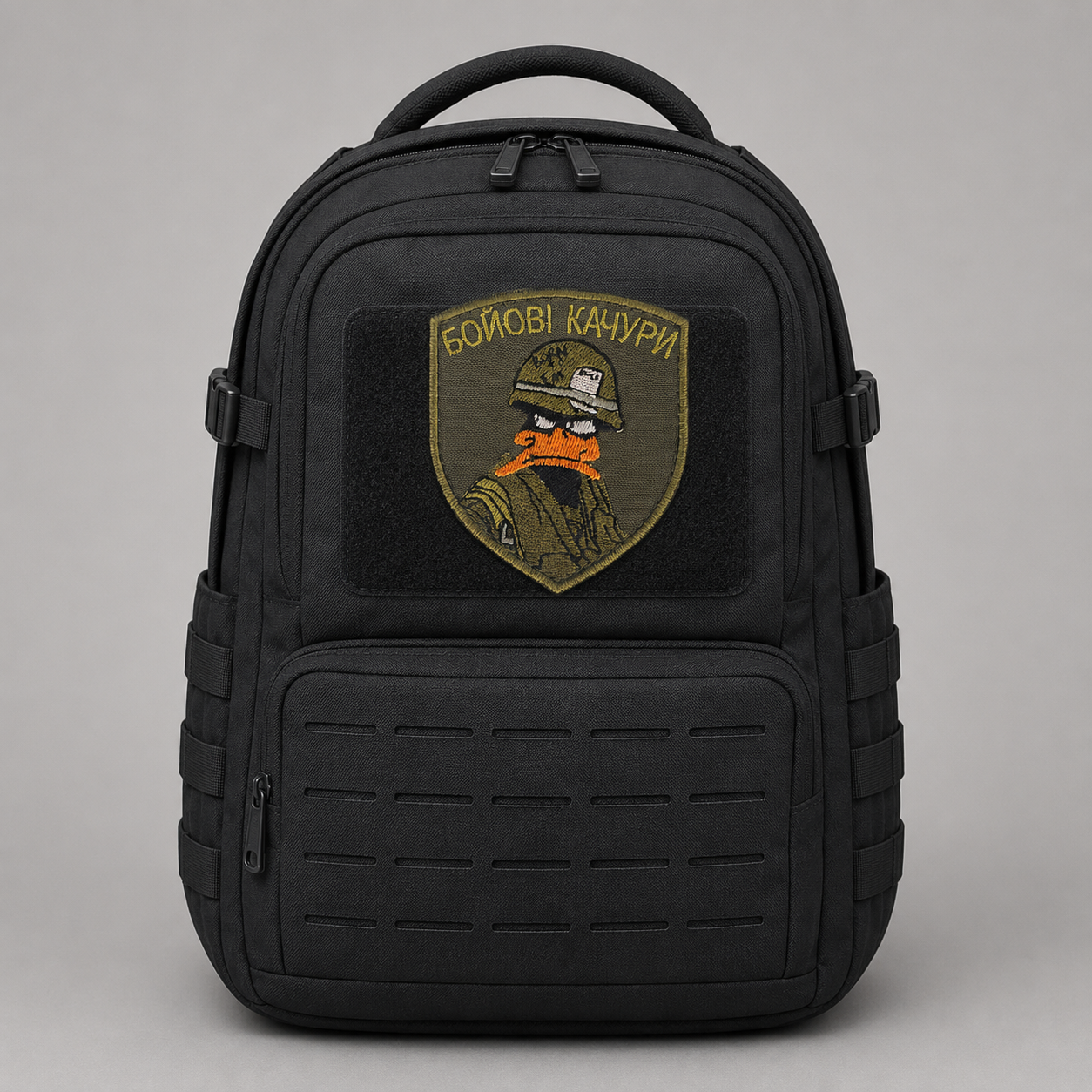 Combat Ducks Ukrainian morale patch attached to a black backpack