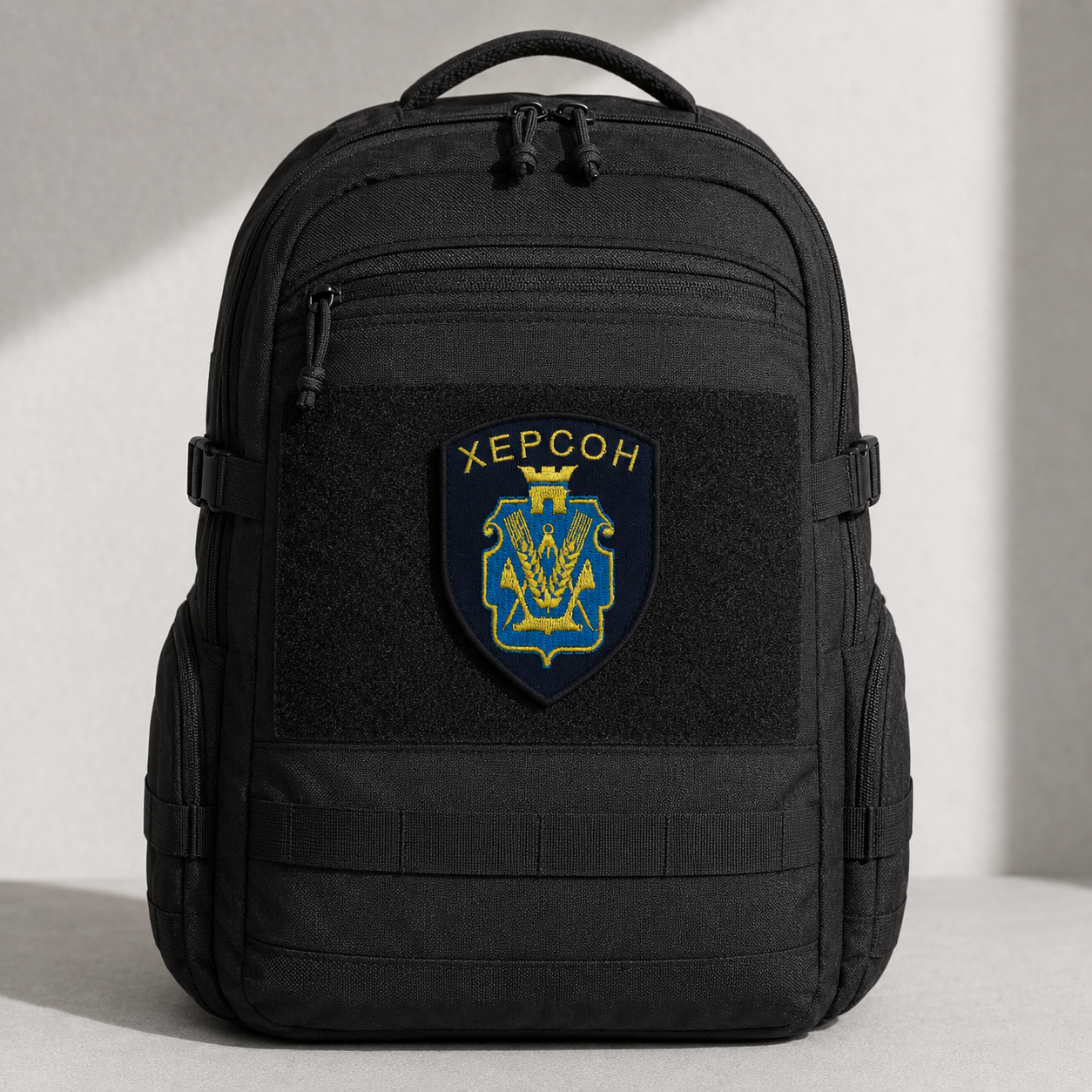 Kherson Ukrainian patch centred on black backpack Velcro panel