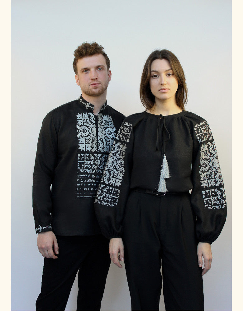 Couple wearing matching Star black linen vyshyvankas with silver embroidery