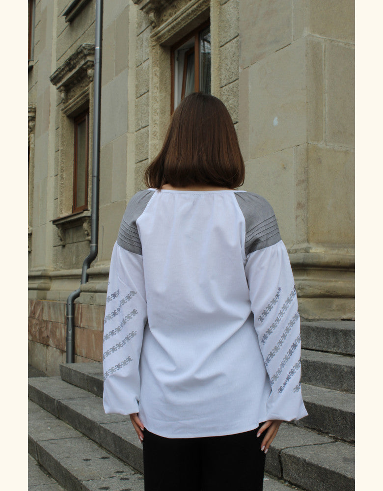 Modern white linen vyshyvanka with traditional Podillia embroidery