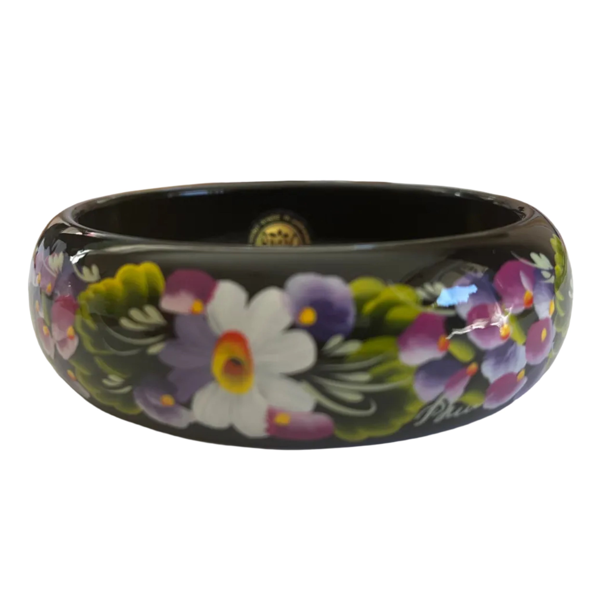 Close-up of Tenderness Petrykivka bracelet with elegant hand-painted floral artwork