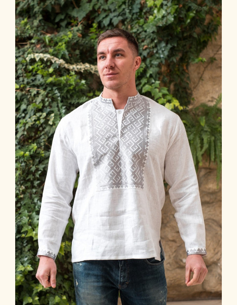 Man wearing Podilya men's linen vyshyvanka with silver embroidery made in Ukraine