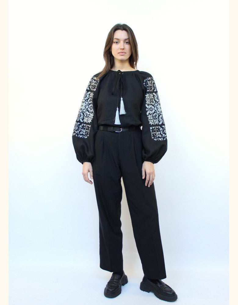 Women's black linen vyshyvanka featuring traditional silver star embroidery