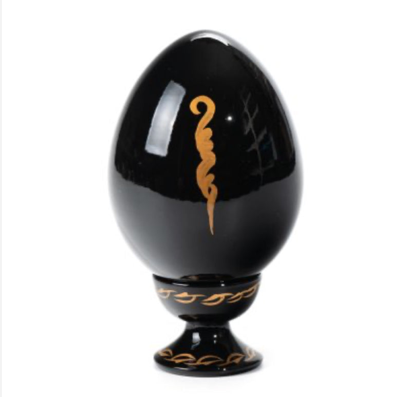 Back view of the Tenderness wooden Ukrainian Easter egg featuring white floral Petrykivka painting