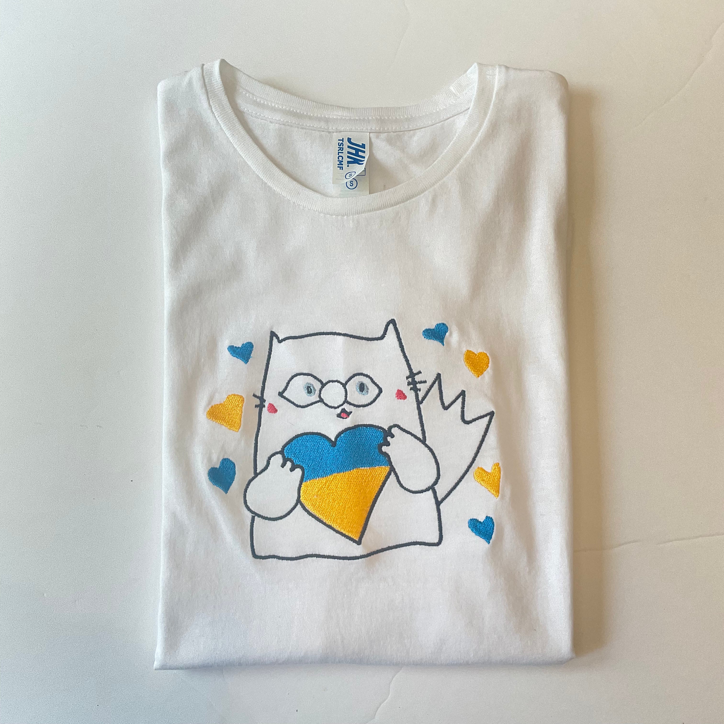 Women's embroidered cat shirt holding a blue and yellow Ukrainian heart