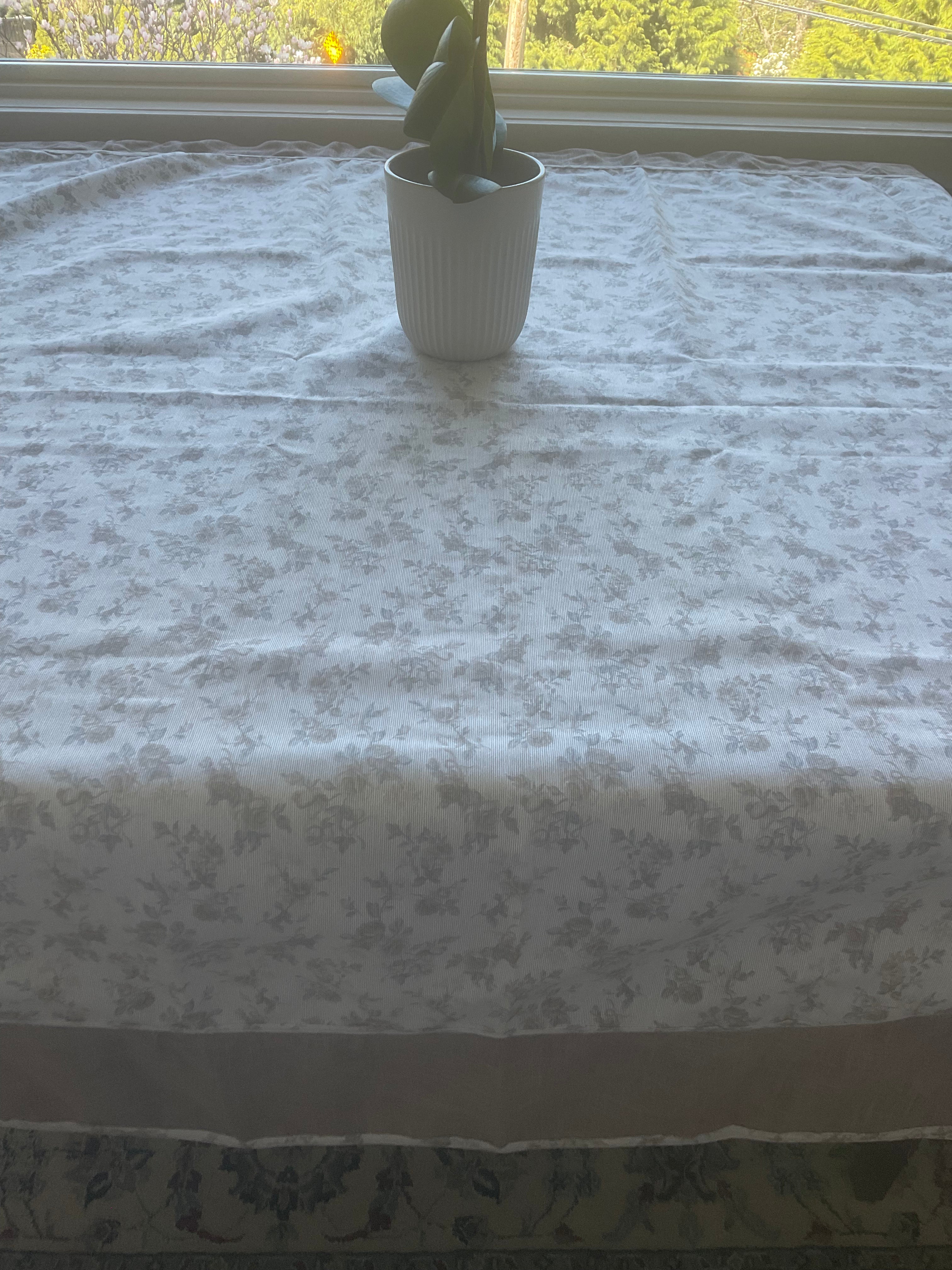 Square floral tablecloth with ruffled edge and vintage style roses