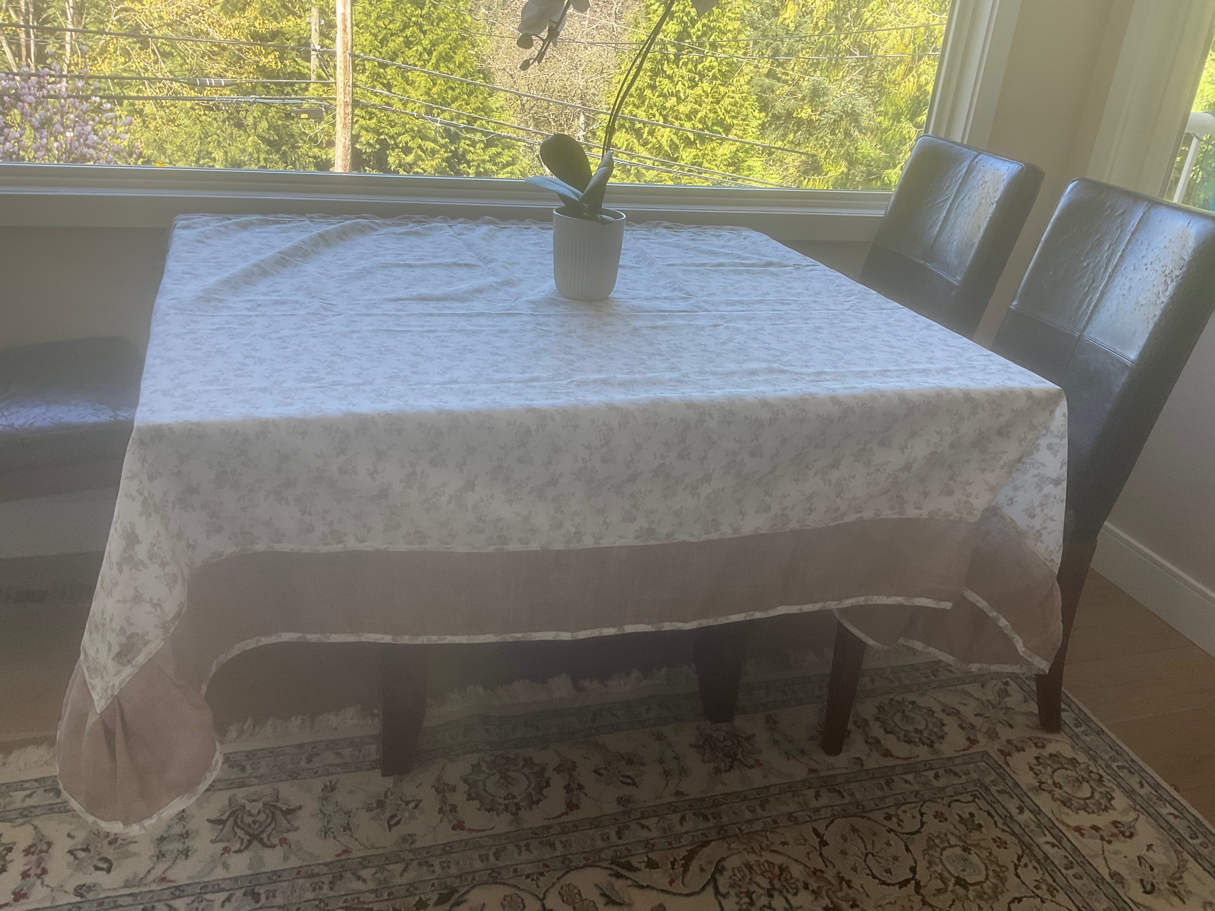 Ukrainian home decor tablecloth with soft neutral tones and flowers