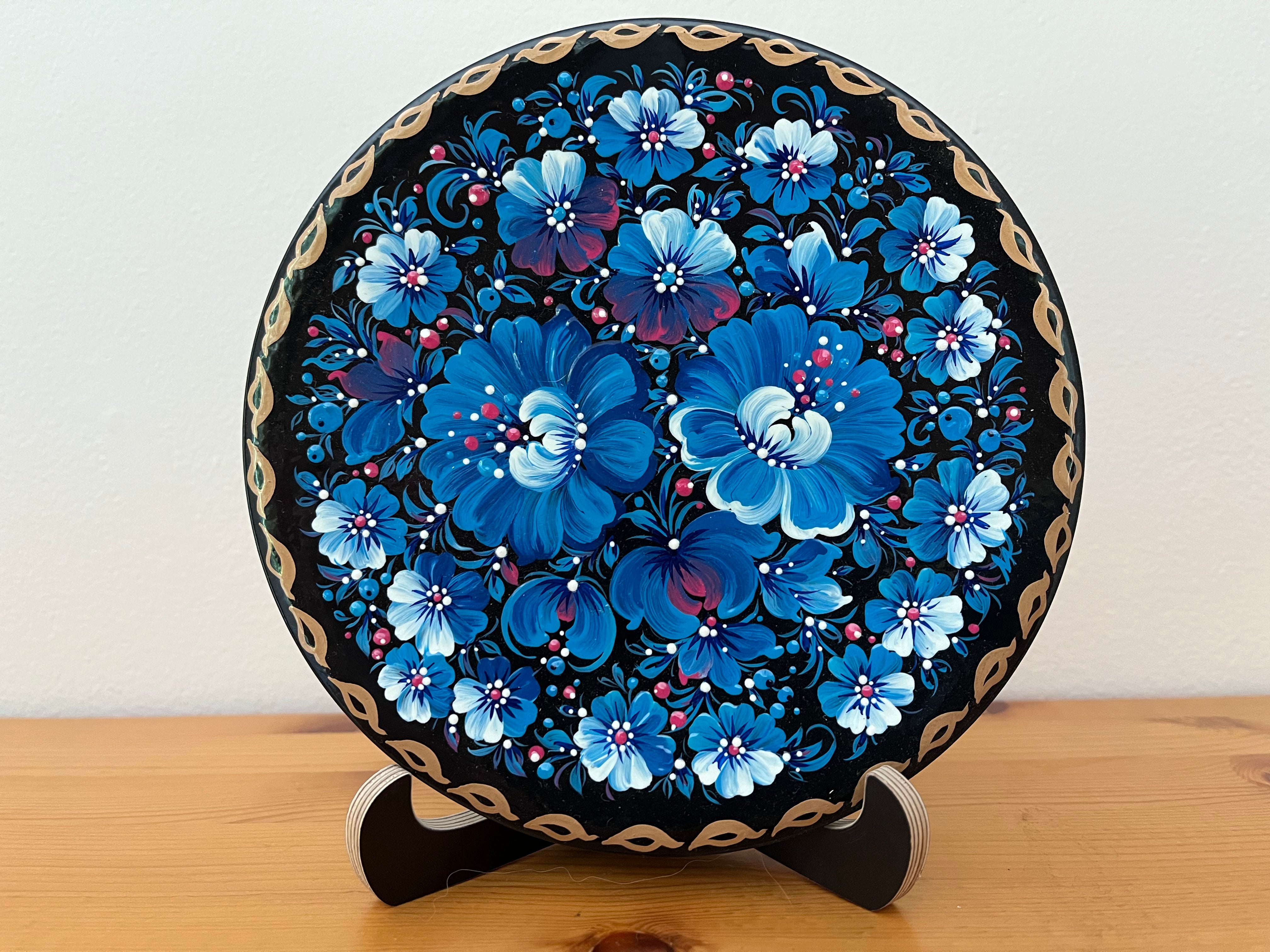 Hand-painted Ukrainian folk art plate with blue floral design and red poppies