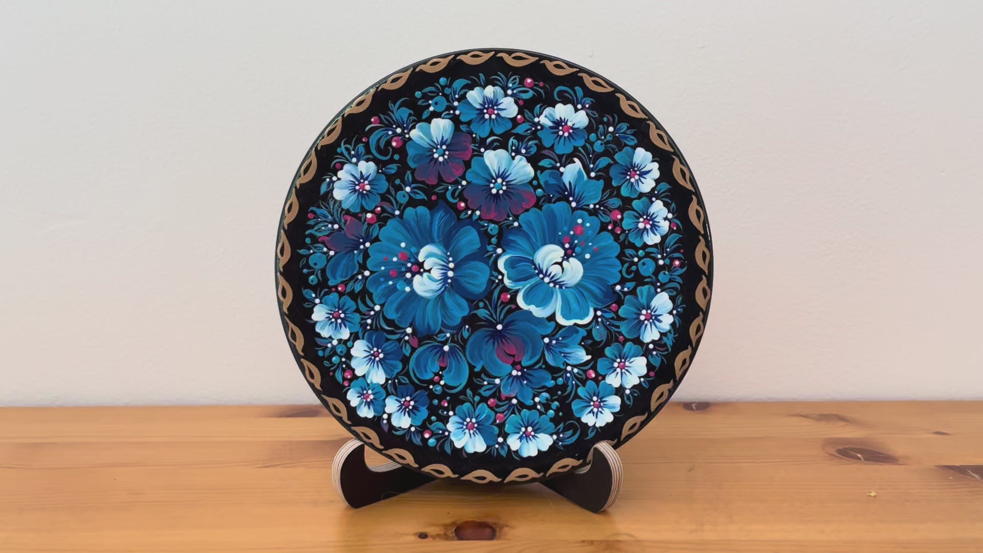 Hand-painted Ukrainian blue floral collection featuring matching Petrykivka home décor handmade in Ukraine