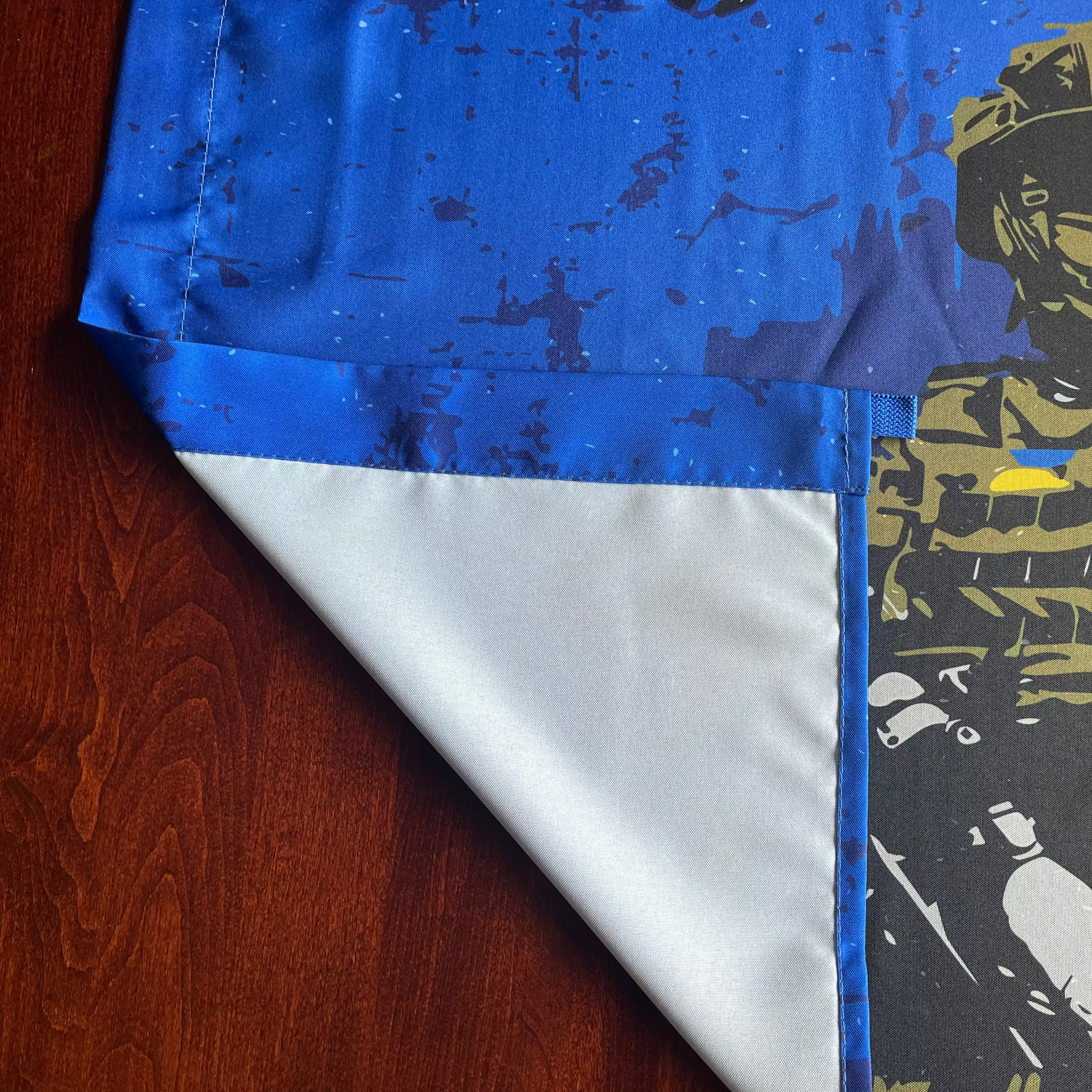 Ukraine defender sniper flag with tactical soldier artwork and distressed blue and yellow design