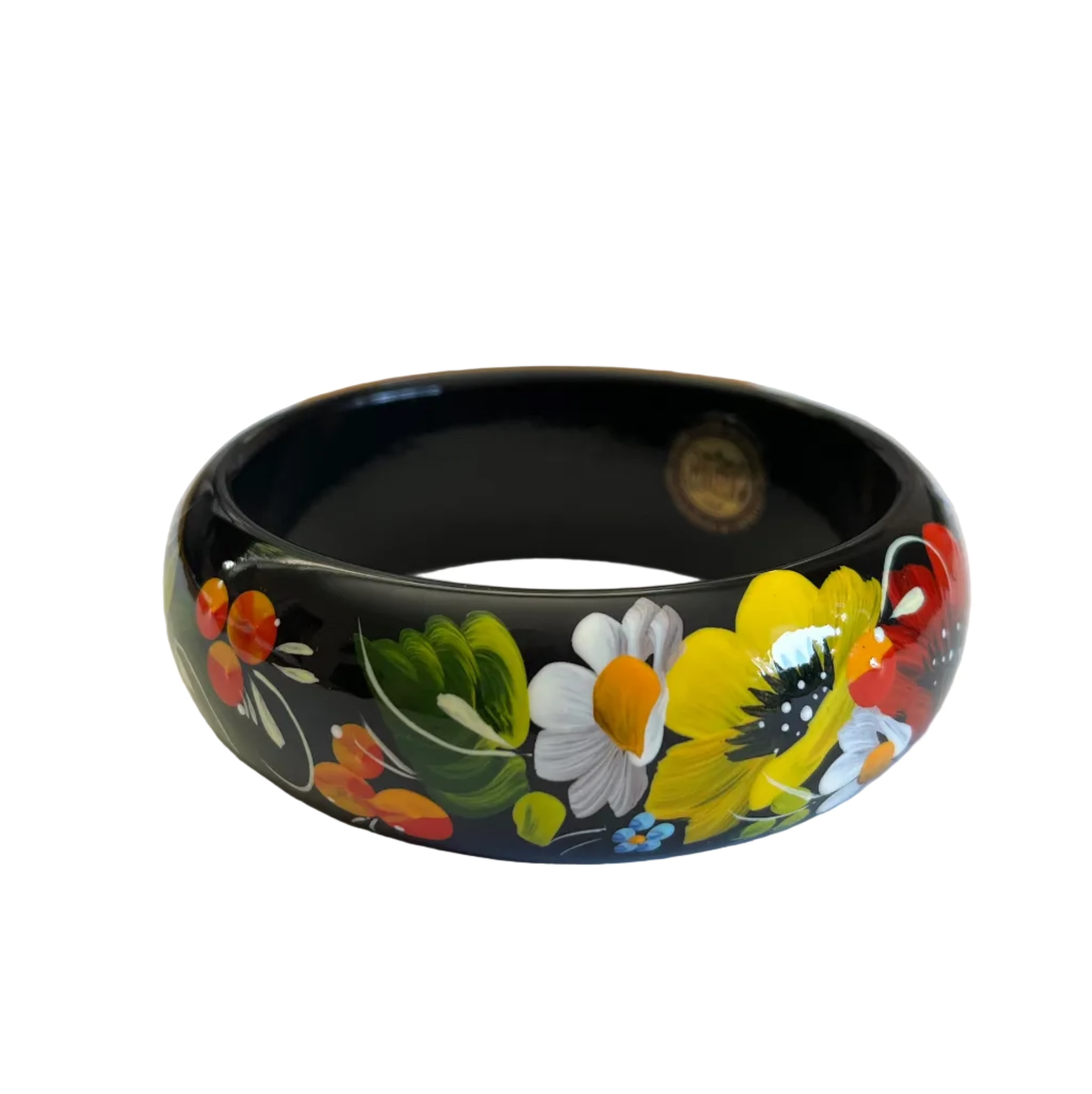 Close-up of Daisies & Poppies Petrykivka bracelet with detailed floral artwork