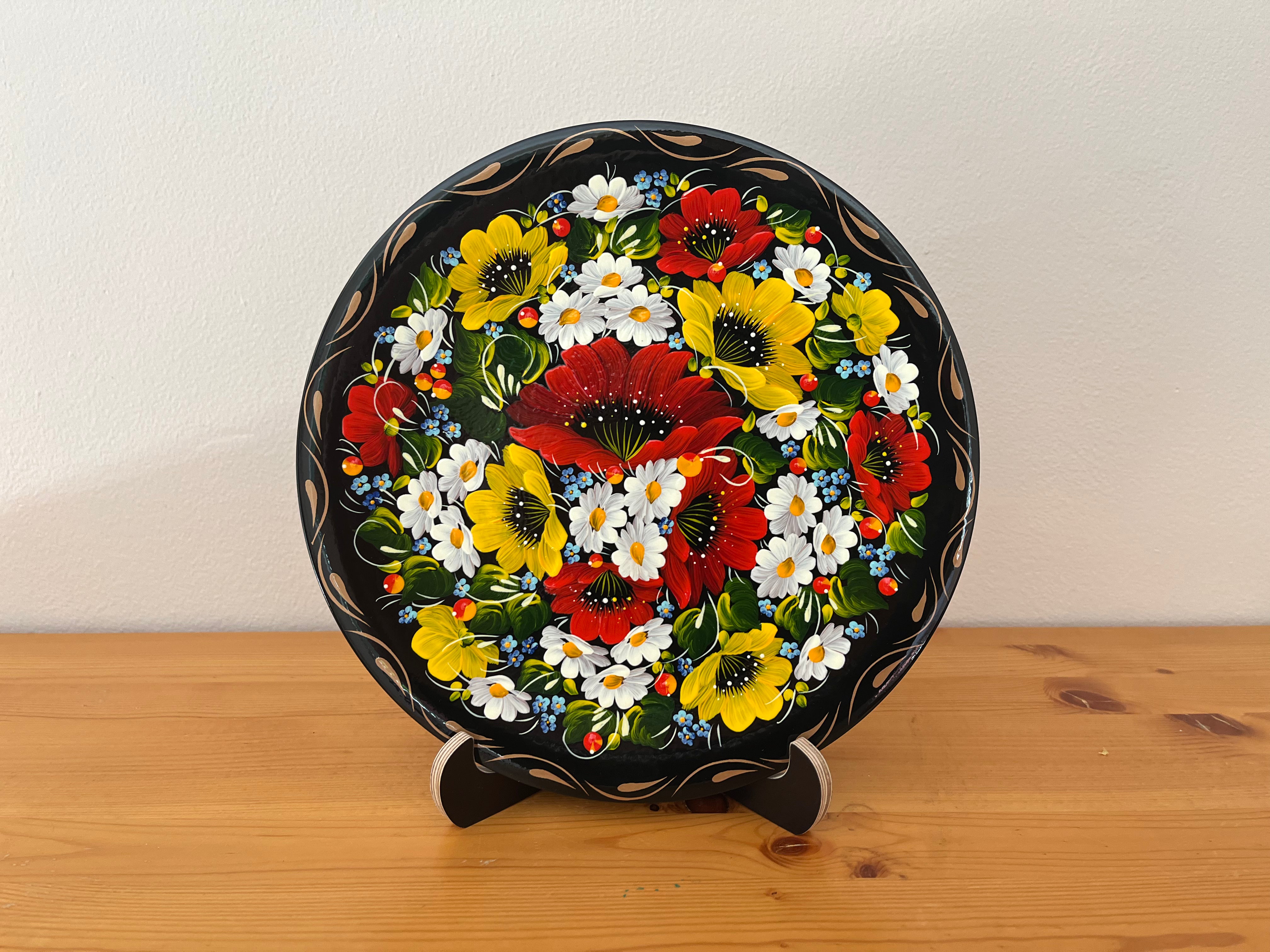 UNESCO-recognized Petrykivka decorative plate hand-painted by Ukrainian artisans