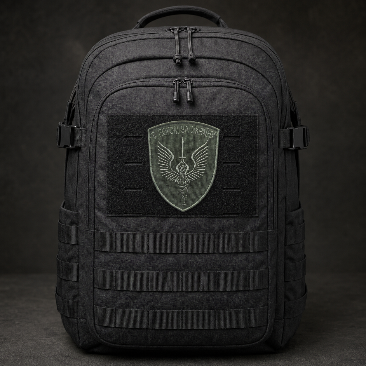 Ukrainian guardian angel patch centred on a black tactical backpack