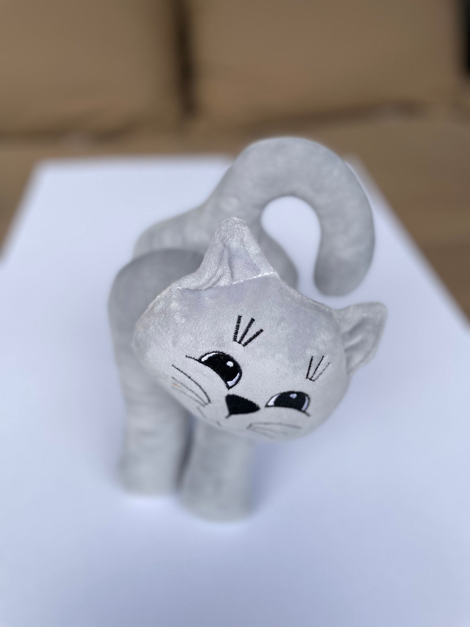 Soft grey cat plush handmade in Ukraine with embroidered face